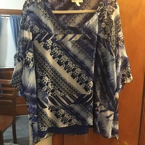 Dana Buchman blouse it is flowy and beautiful blue dressy top sheer